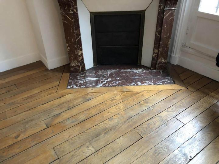 Pose de parquet massif cloué à Paris